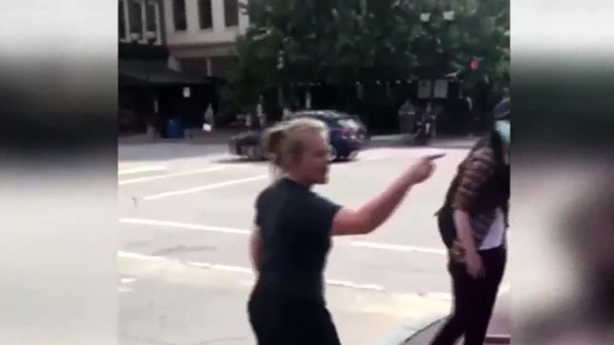 A woman in Asheville, N.C., was caught on video hurling racial epithets at a family visiting...
