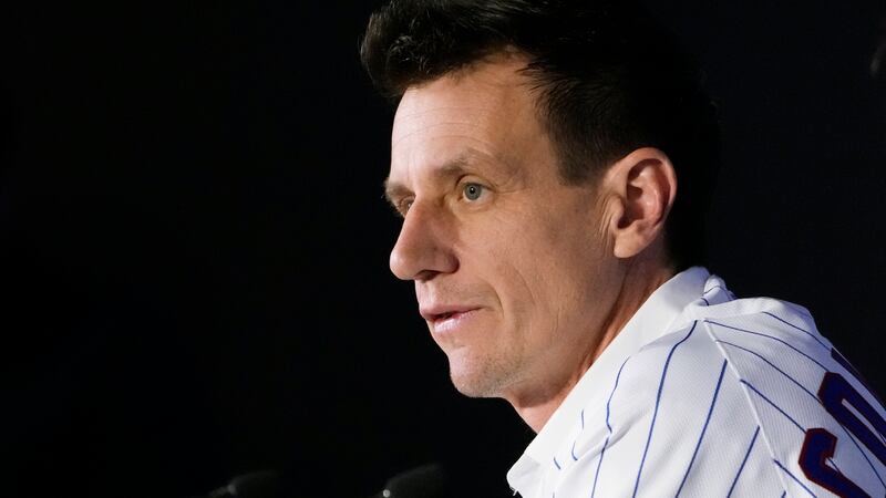 Chicago Cubs new baseball team manager Craig Counsell listens to a question during a press...