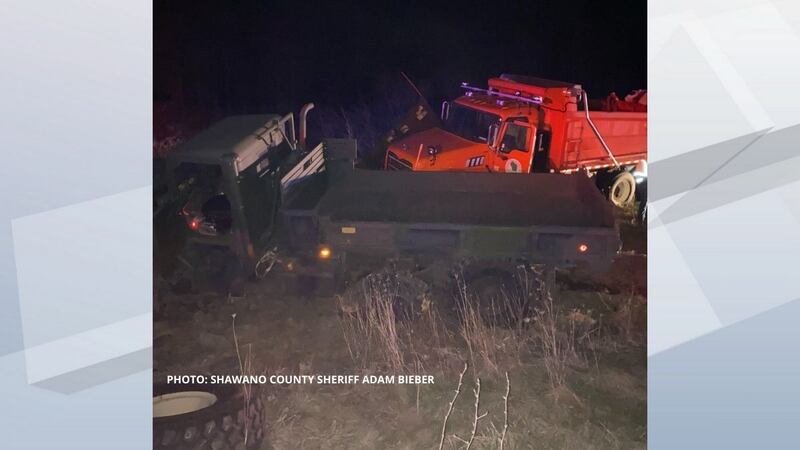 Deputies use a snowplow truck to stop a military vehicle in Shawano County. May 8, 2022.
