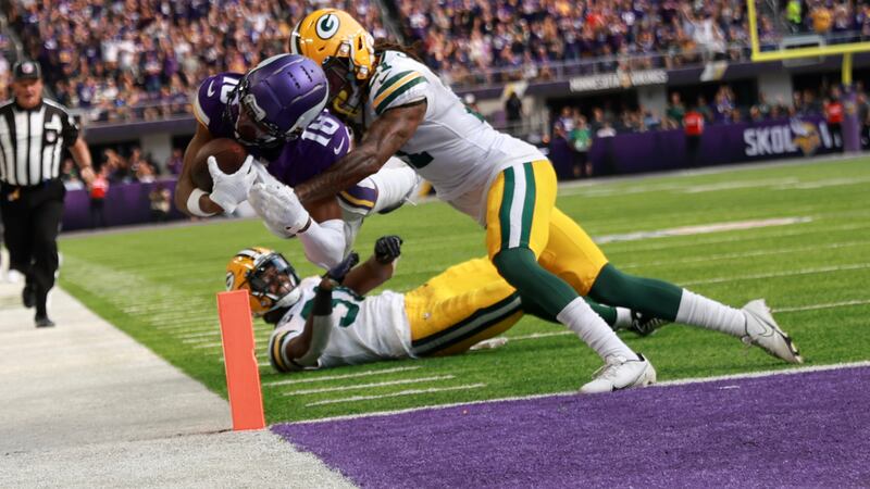 Minnesota Vikings wide receiver Justin Jefferson (18) scores on an 36-yard touchdown reception...