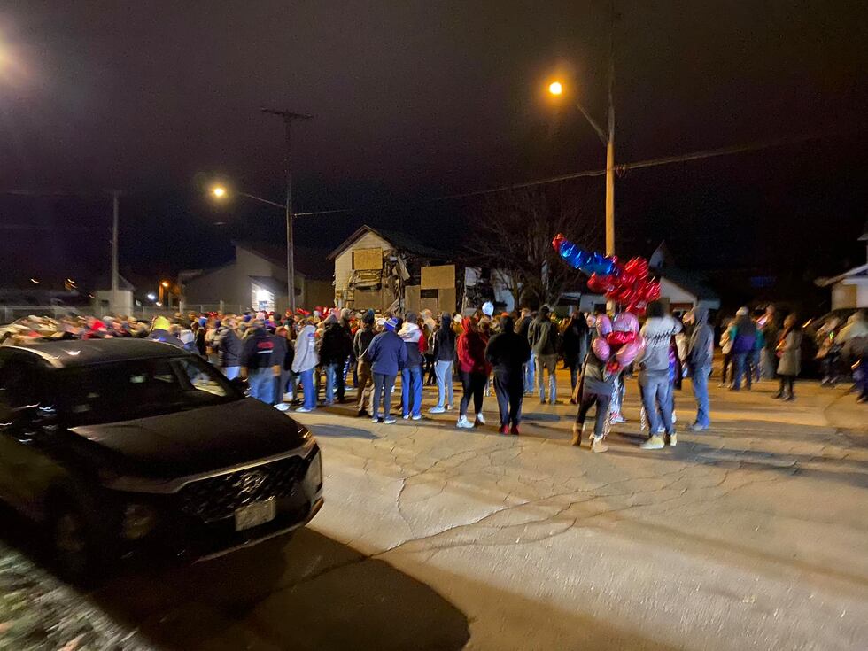 A vigil was held Monday night to honor the three victims in a Watertown home fire.