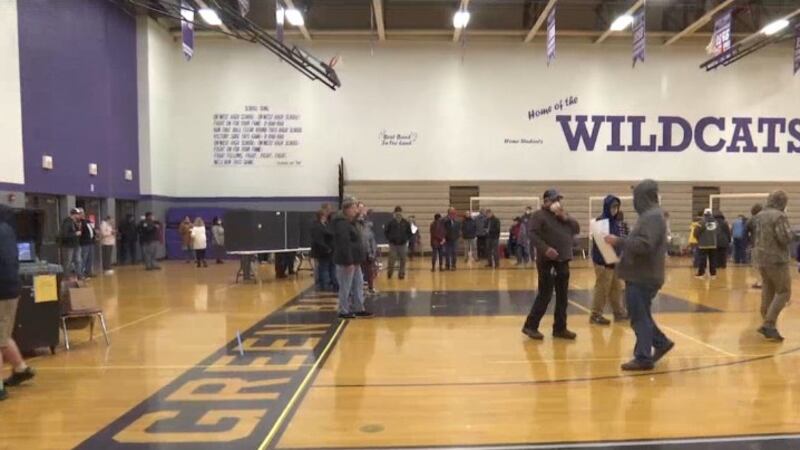 People wait to vote at Green Bay West High School. April 7, 2020. (WBAY Photo)