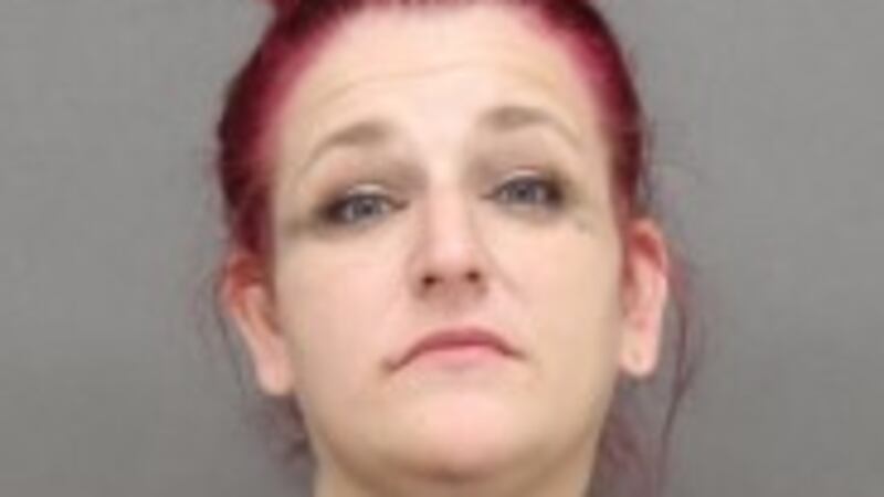 Woman arrested, accused of dragging a police officer while trying to flee a traffic stop