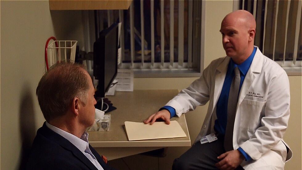 Picture of Dr. Ryan Bly with a Patient