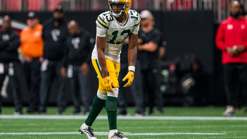 Green Bay Packers wide receiver Dontayvion Wicks (13) lines up during the first half of an NFL...