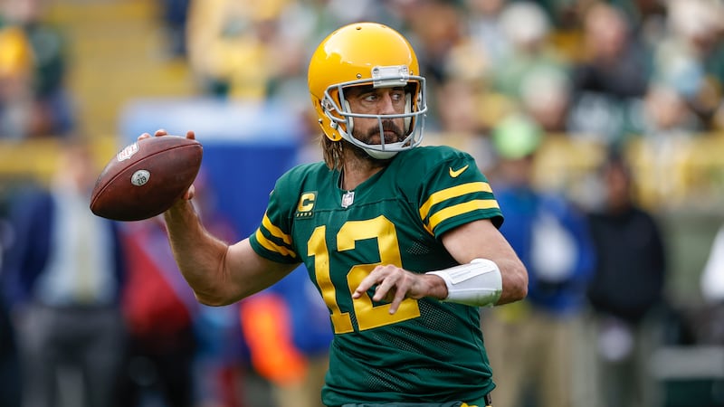 Green Bay Packers quarterback Aaron Rodgers (12) looks to pass the ball during the first half...