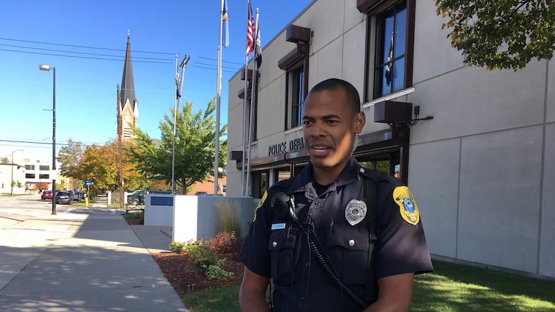 Officer Daryl Robinson in front of the Green Bay Police Department (WBAY photo)