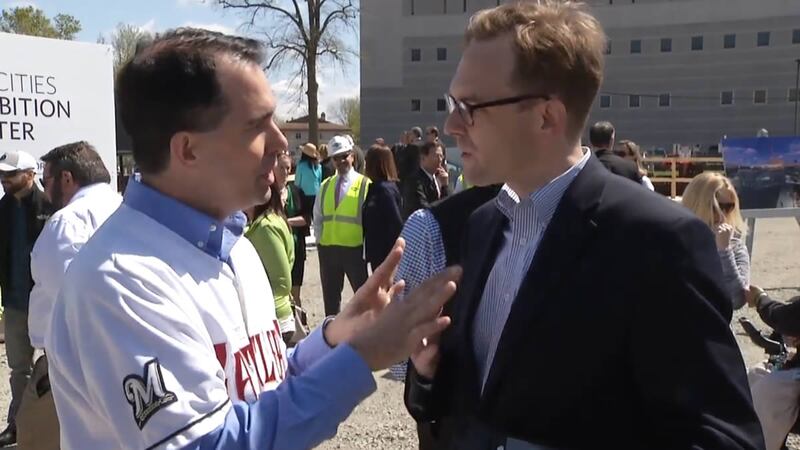 Gov. Scott Walker and Outagamie County Executive Tom Nelson get into a heated exchange about...