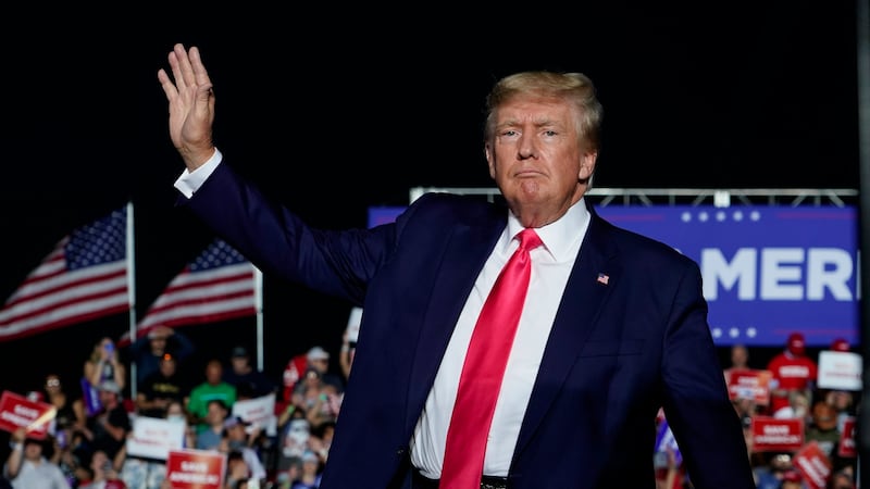 FILE - Former President Donald Trump arrives at a rally, Aug. 5, 2022, in Waukesha, Wis. A...