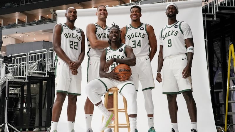 Milwaukee Bucks' Khris Middleton (22), Brook Lopez, second from left, Giannis Antetokounmpo...