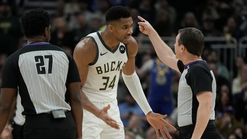 Milwaukee Bucks' Giannis Antetokounmpo is ejected from the game during the second half of an...