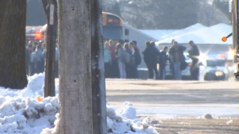 Students evacuated from Oshkosh West High School after an officer-involved shooting. (WBAY Photo)